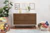 Picture of Palma 7 Drawer Dresser -Warm White with Walnut Drawer Fronts and legs - by Babyletto