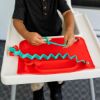 Picture of A Busy Baby Toy Bungee - Olive