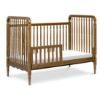 Picture of Liberty 3-in-1 Convertible Spindle Crib with Toddler Bed Conversion Kit - Natural Walnut | Namesake Home